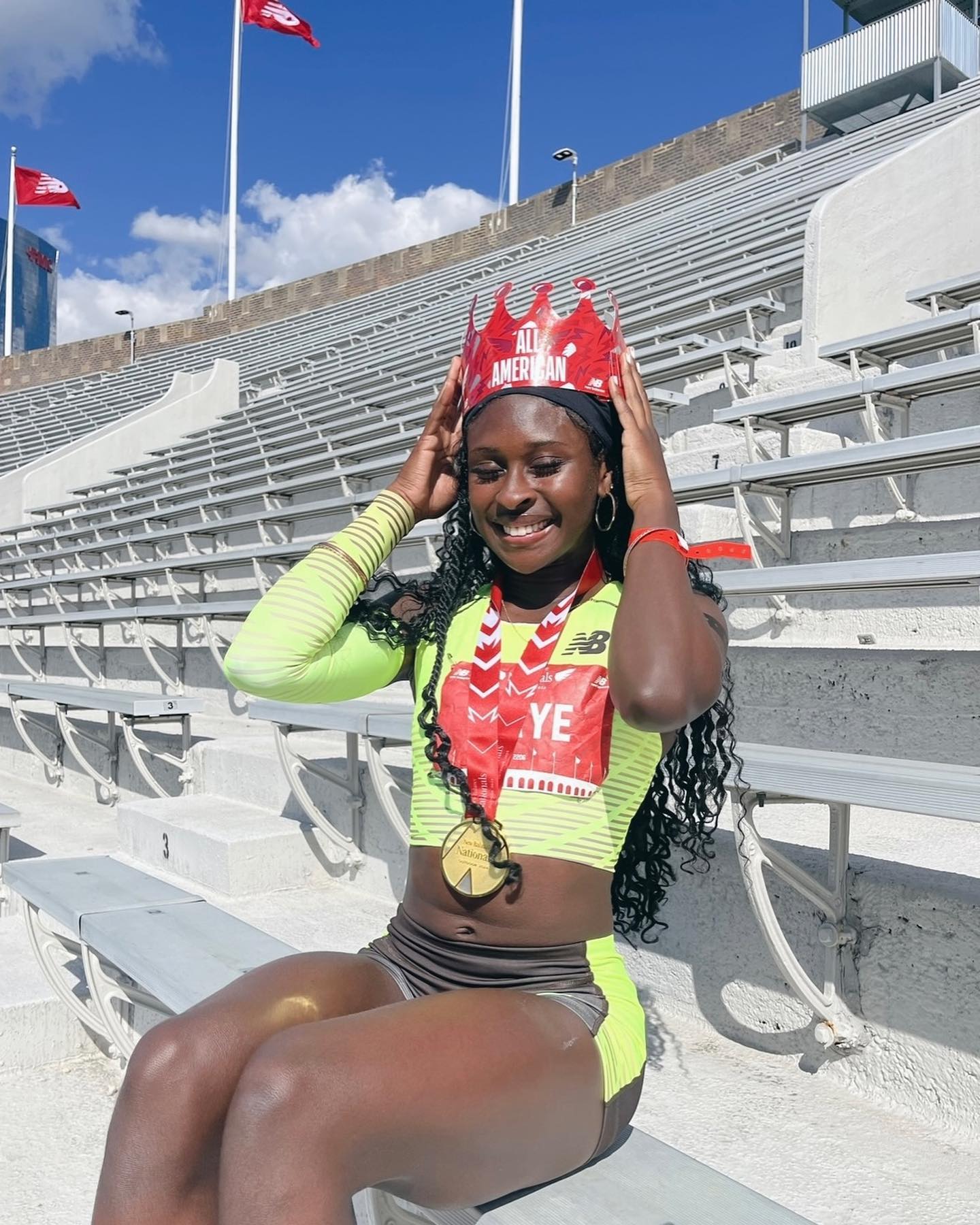 Lisa Raye placing a crown on her head