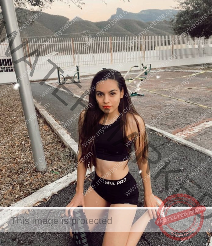 Andrea Guajardo posing on the track