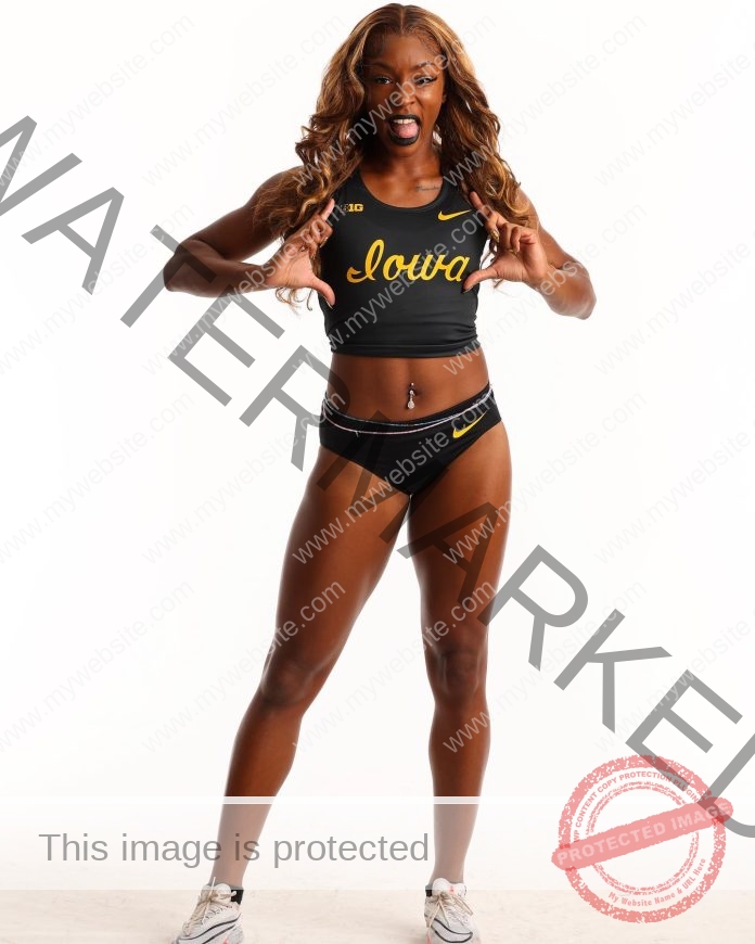 Tionna Tobias poses in her Iowa track uniform for official team pictures.
