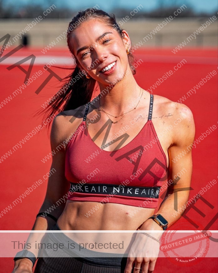 Olivija Vaitaitytė smiles at the camera during practice.