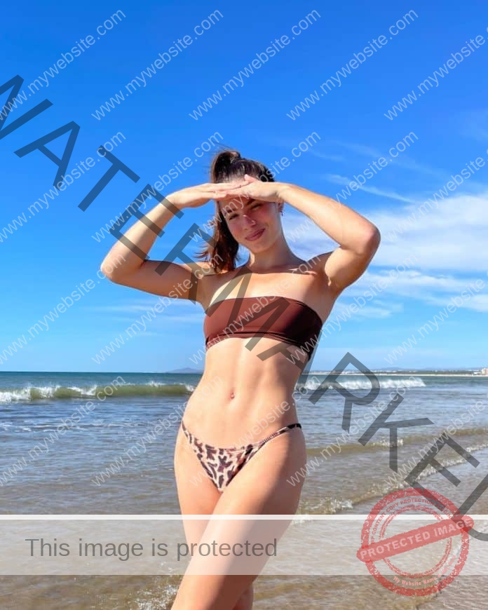 Alice Hopkins in a bikini at the beach
