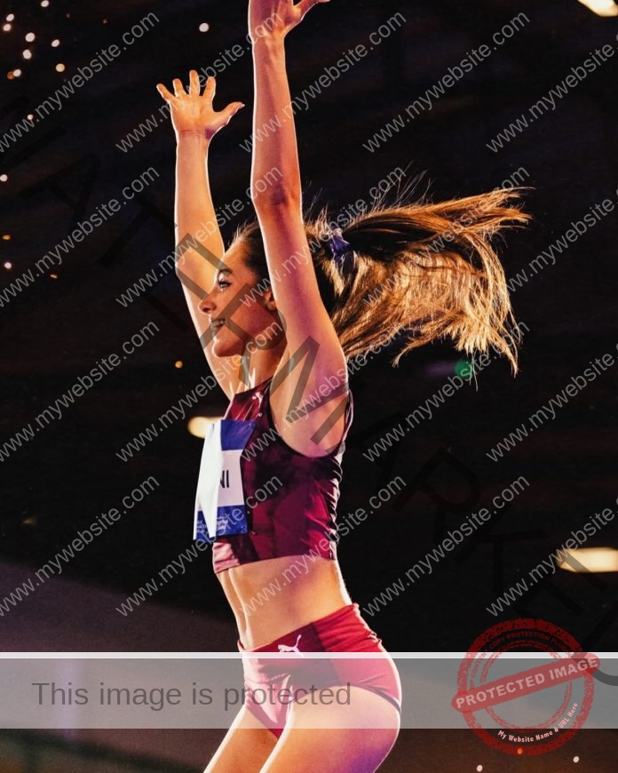 Asia Tavernini celebrates after a successful high jump