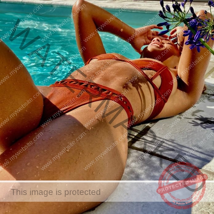 Aaliyah Rifort Delem Aaliyah Rifort Delem, track athlete at Grand Canyon University, lays poolside in a rust bikini, sunlit with water droplets.