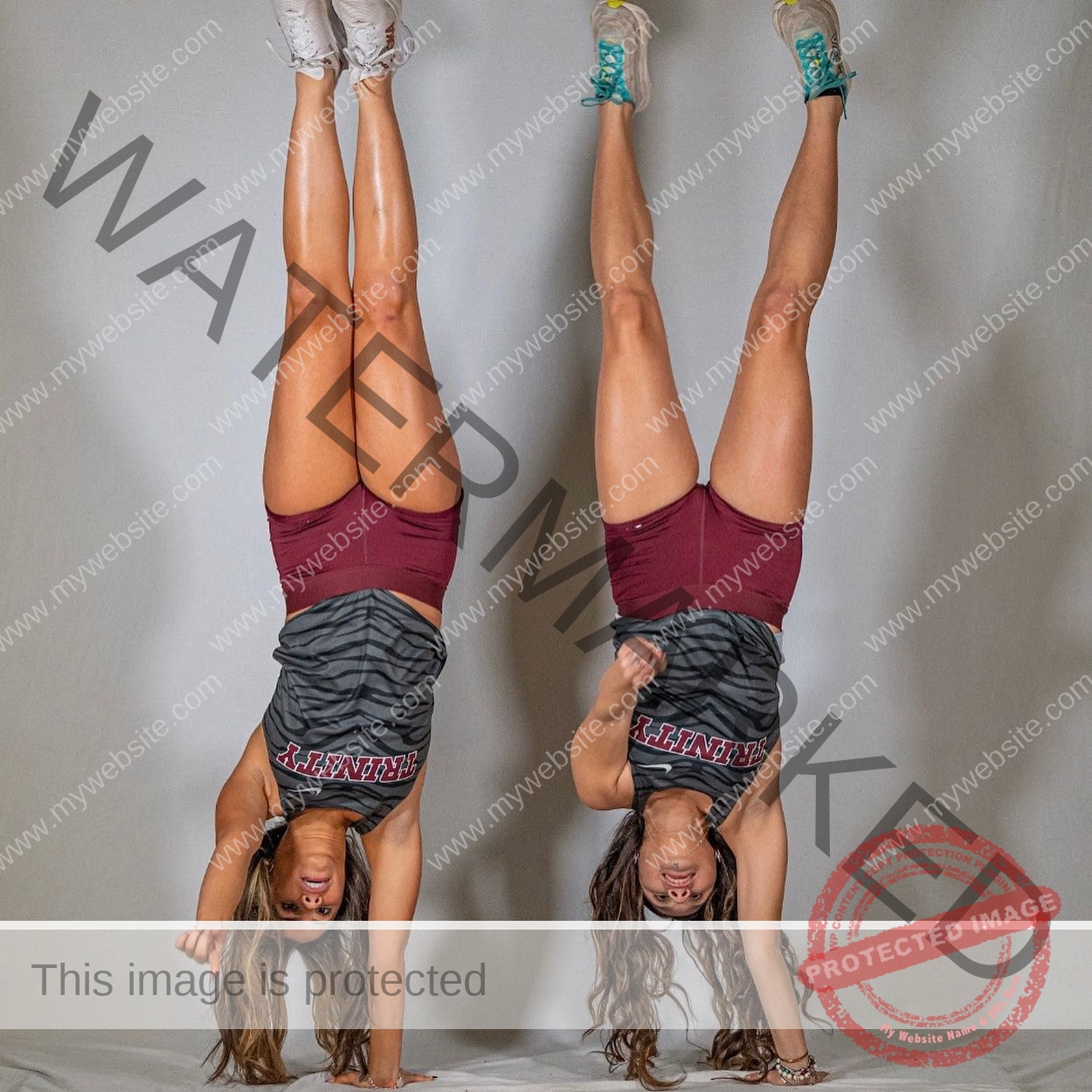 ciandra-carrico-trinity-ciandracarrico-4269 Ciandra Carrico, track athlete from Trinity, balances in handstand with teammate. Both have straight legs; hair hangs toward floor.