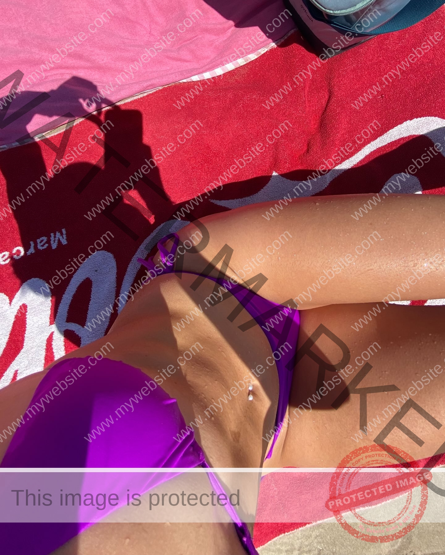 elena-corella-spain-elenacorella_-1093 Elena Corella A person, possibly track and field athlete Elena Corella from Spain, sunbathes on a red towel with torso and legs visible.