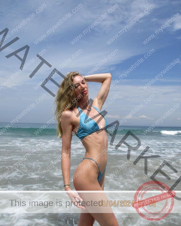 Grace Valette Grace Valette, a Hunter College student, stands confidently in a blue bikini on the beach; date 10/04/2024 07:58 shown.