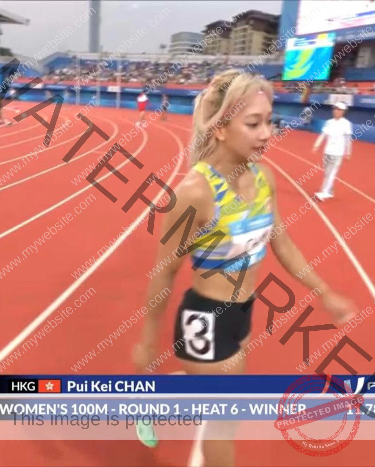 chan-pui-kei-hong-kong-chanpuikeii-02936 Chan Pui Kei, track and field star from Hong Kong, in yellow and blue gear, #3 shorts, wins Women's 100m Heat 6 in 11.72s.