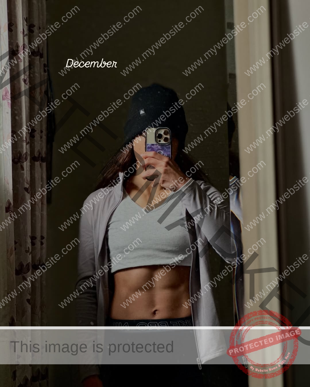niharika-vashisht-india-niharika.vashhisht-05965 Niharika Vashisht, track and field star from India, in a beanie and sports bra snaps a mirror selfie; "December" appears above.