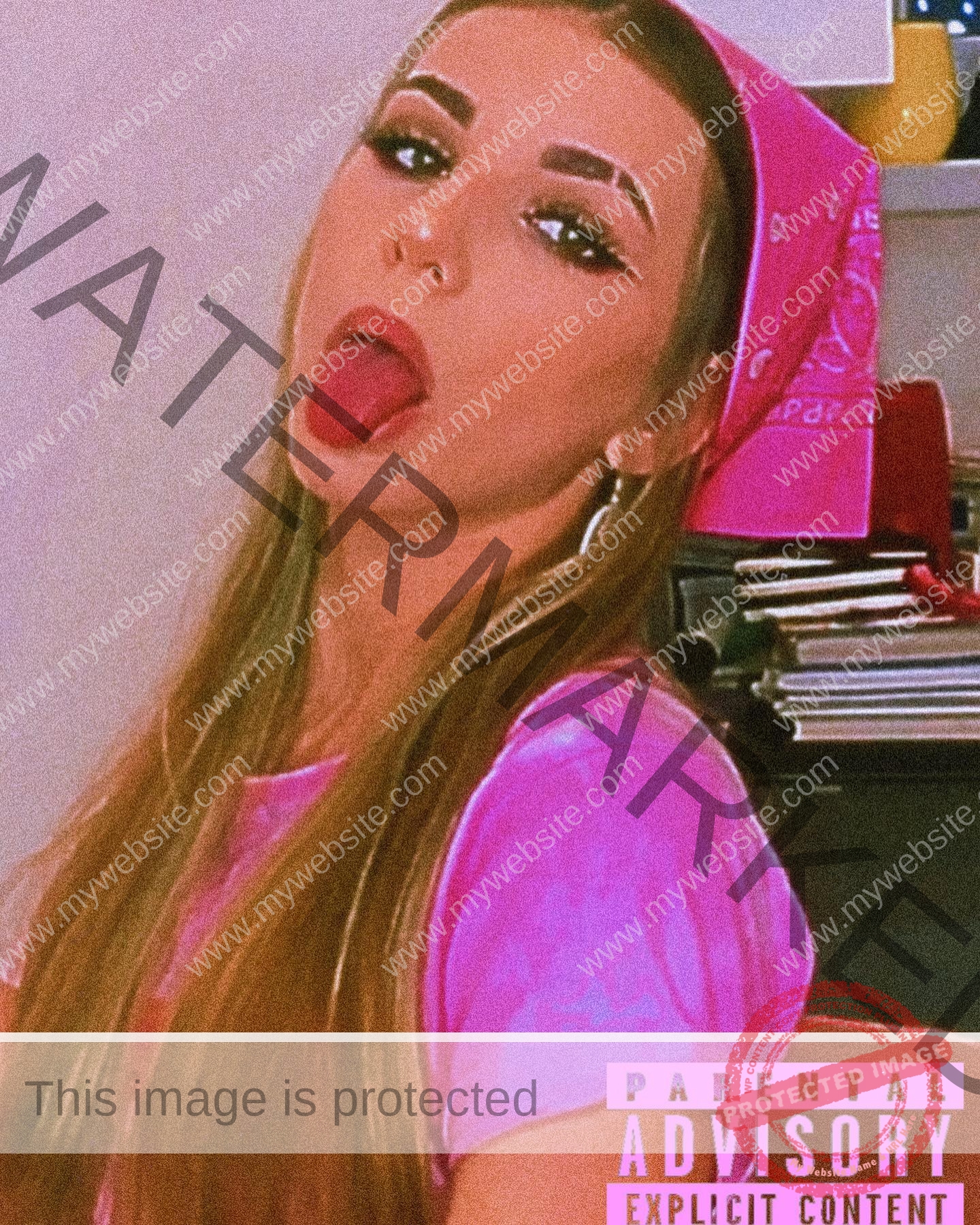 viktoriya-antipova-russia-viichkaaaaa-03446 Viktoriya Antipova, track and field star from Russia, in a pink shirt and bandana sticks out her tongue; explicit content label.