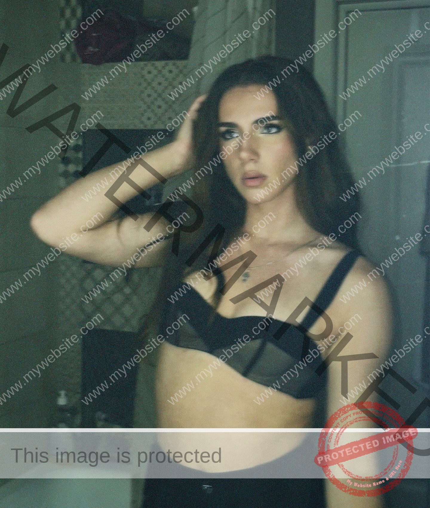 viktoriya-antipova-russia-viichkaaaaa-03738 Viktoriya Antipova, track and field star from Russia, poses in a black mesh bralette and pants before a bathroom mirror with tiled walls.